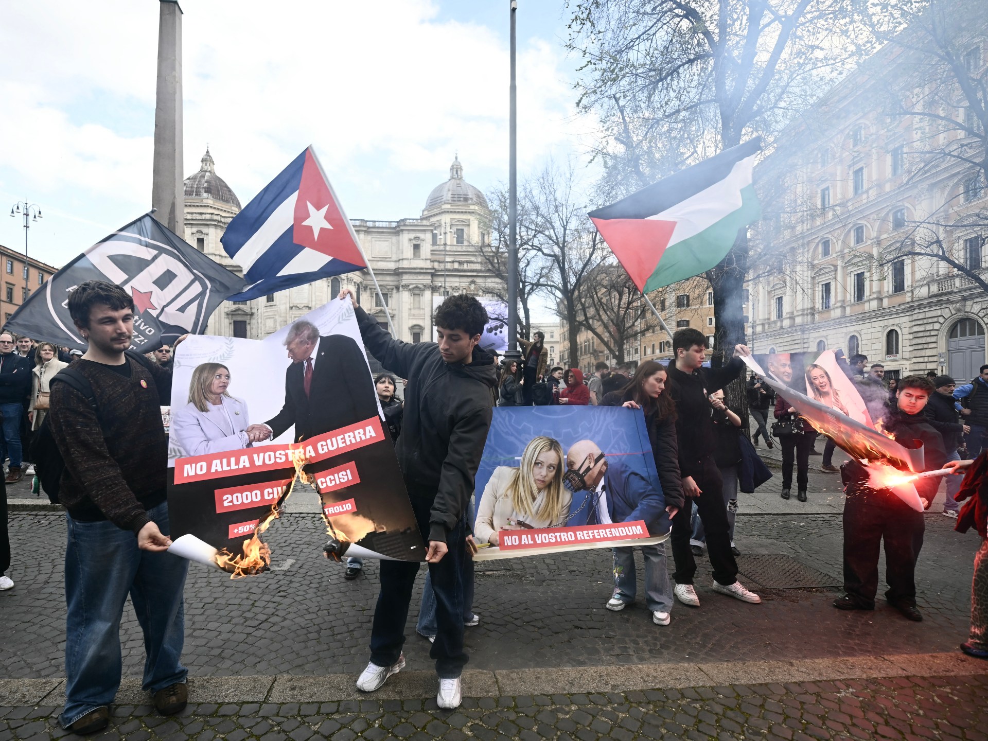 متظاهرون يحرقون صورا لترمب وميلوني في روما تنديدا بسياسات الحكومة والحرب